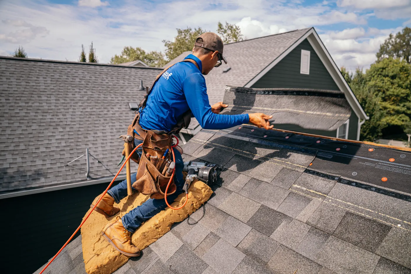 Tarping and dry-in on a Millhousen commercial roof